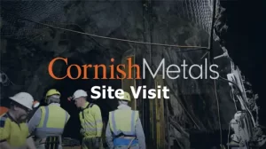 Miners underground in high-vis vests, Cornish Metals logo, on-screen text: Site visit